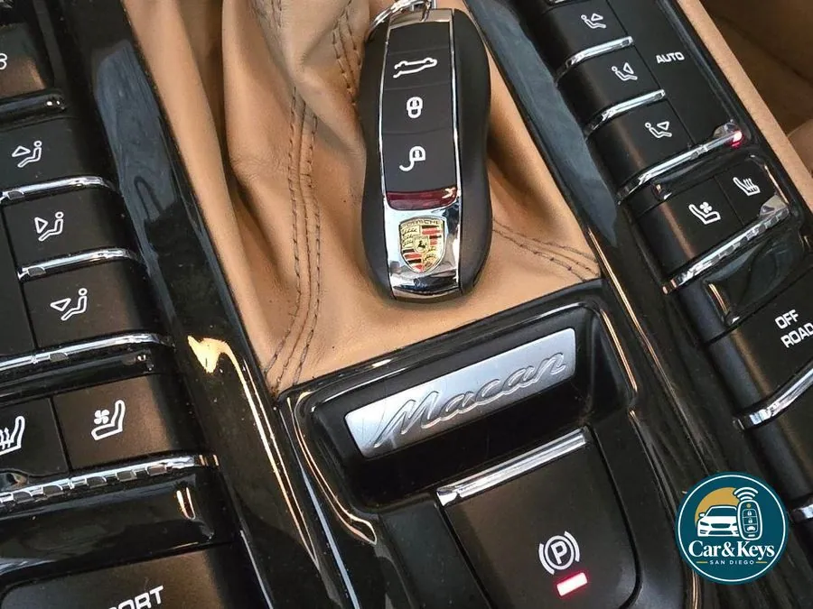 A Porsche Cayenne key at the console